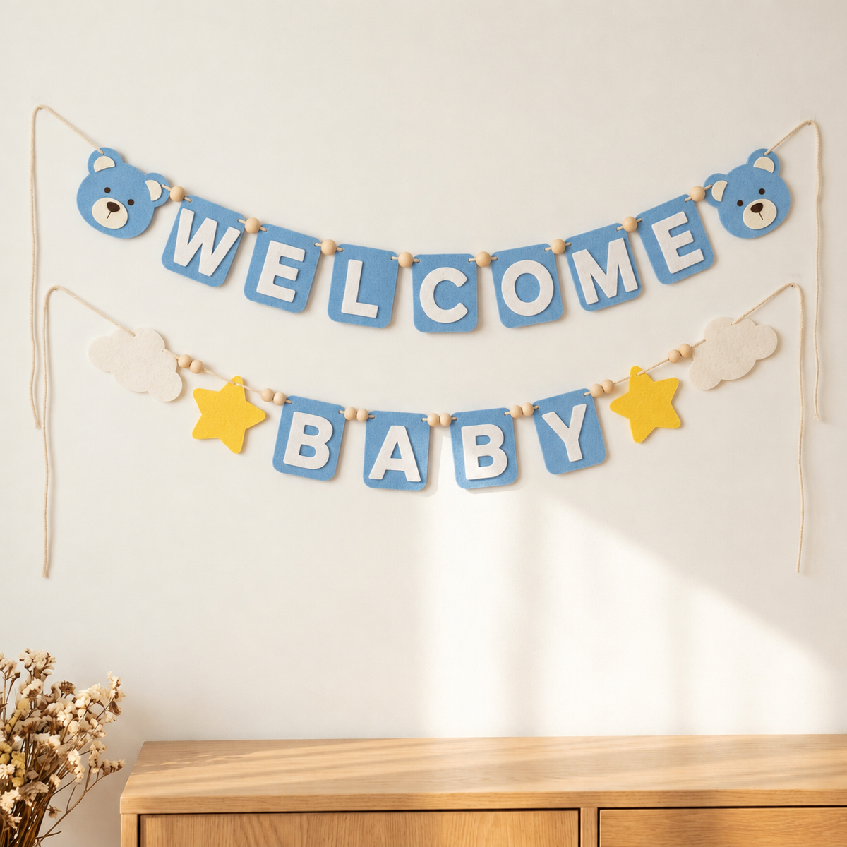 Blue WELCOME BABY felt garland with teddy bear faces, clouds and yellow stars