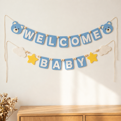 Blue WELCOME BABY felt garland with teddy bear faces, clouds and yellow stars