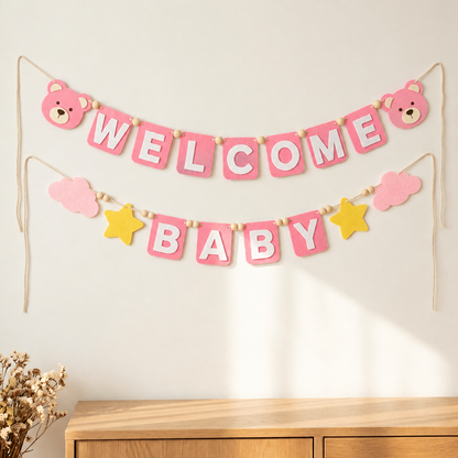 Pink WELCOME BABY felt garland with teddy bear faces, clouds and yellow stars